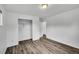 Clean bedroom featuring hardwood floors, light-colored walls, and a closet, creating a modern atmosphere at 641 E 104Th Pl, Northglenn, CO 80233