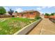 Charming brick home with a well-maintained lawn and mature trees in a serene neighborhood setting at 641 E 104Th Pl, Northglenn, CO 80233