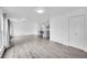 Spacious living room with hardwood floors and plenty of natural light, creating a warm and inviting atmosphere at 641 E 104Th Pl, Northglenn, CO 80233