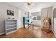Study featuring hardwood floors, natural light, and an easel at 7425 S Utica St, Littleton, CO 80128