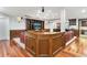 Entertain in the cozy living space with custom trim and built-in shelving at 7425 S Utica St, Littleton, CO 80128