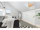 Cozy bedroom with a daybed and black and white rug at 3260 Curtis St, Denver, CO 80205