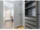 Spacious closet with built-in shelves, drawers and rod at 3260 Curtis St, Denver, CO 80205