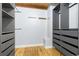 Large walk-in closet with ample shelving and drawers at 3260 Curtis St, Denver, CO 80205