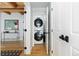 Convenient laundry room with stackable washer and dryer at 3260 Curtis St, Denver, CO 80205