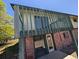 Exterior view of an elevated deck and brick foundation at 327 S Pine St, Elizabeth, CO 80107