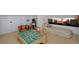 Versatile attic space featuring a bed nook, play area, and comfortable seating for entertainment and relaxation at 747 N Downing St, Denver, CO 80218