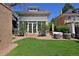 Beautiful backyard with a well-manicured lawn, patio, and inviting outdoor seating at 747 N Downing St, Denver, CO 80218