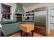 Cozy kitchen featuring blue cabinetry, stainless steel appliances, and butcher block island at 747 N Downing St, Denver, CO 80218