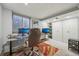 Finished basement with an egress window, carpet, and a closet, ideal for a home office at 7474 E Arkansas Ave # 13-02, Denver, CO 80231