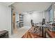 Finished basement with gray walls, finished ceiling, and a desk with an office chair at 7474 E Arkansas Ave # 13-02, Denver, CO 80231