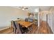 Dining room with hardwood floors is situated between the kitchen and living room at 7474 E Arkansas Ave # 13-02, Denver, CO 80231