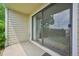 Private patio featuring a sliding glass door and space for outdoor seating at 7474 E Arkansas Ave # 13-02, Denver, CO 80231