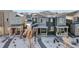 Aerial view of townhomes in a snow-covered community at 23527 E 5Th Pl, Aurora, CO 80018