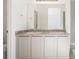 Bathroom with double vanity, granite countertop and stylish fixtures at 23527 E 5Th Pl, Aurora, CO 80018