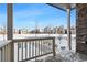 Inviting front porch showcasing community views, adorned with stone accents at 23527 E 5Th Pl, Aurora, CO 80018