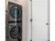 Stackable LG washer and dryer in laundry closet at 23527 E 5Th Pl, Aurora, CO 80018