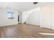 Bright living room with hardwood floors and staircase at 23527 E 5Th Pl, Aurora, CO 80018