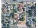 An aerial view shows the property's location in a residential neighborhood with mature trees and proximity to local amenities at 4567 Grove St, Denver, CO 80211