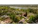 Aerial view of a neighborhood with a lake in the distance at 4567 Grove St, Denver, CO 80211
