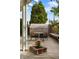 Relaxing patio with outdoor dining table, barrel sauna, and garden at 4567 Grove St, Denver, CO 80211