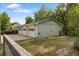 Large garage with four bays, offering ample parking and storage space at 4567 Grove St, Denver, CO 80211