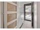 Convenient laundry room with modern washer/dryer and outdoor access at 4567 Grove St, Denver, CO 80211