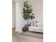Bright living room showcasing neutral decor, modern accents, and ample natural light, creating a cozy and stylish space at 4567 Grove St, Denver, CO 80211