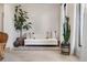 Bright living room showcasing neutral decor, modern accents, and ample natural light, creating a cozy and stylish space at 4567 Grove St, Denver, CO 80211