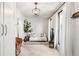 Bright living room showcasing neutral decor, modern accents, and ample natural light, creating a cozy and stylish space at 4567 Grove St, Denver, CO 80211
