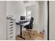 Dedicated home office with modern desk, comfortable chair, and ample storage space at 4567 Grove St, Denver, CO 80211