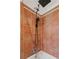 Modern tiled shower features a rainfall showerhead and handheld sprayer at 4567 Grove St, Denver, CO 80211
