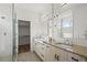 Modern bathroom with double vanity, glass shower, and sleek fixtures at 919 Russell St, Golden, CO 80401