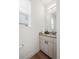 Modern powder room featuring a wood grain vanity and a square sink at 919 Russell St, Golden, CO 80401