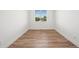 Bedroom featuring wood floors, neutral walls, with a bright window at 919 Russell St, Golden, CO 80401