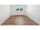 Bedroom featuring wood floors, neutral walls, with a bright window at 919 Russell St, Golden, CO 80401