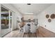 Open dining area adjacent to the kitchen with bright lighting at 919 Russell St, Golden, CO 80401