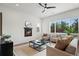 Bright living room with fireplace, stylish furniture, and lots of natural light at 919 Russell St, Golden, CO 80401