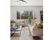 Inviting living room featuring neutral tones and views of the backyard at 919 Russell St, Golden, CO 80401