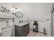 Stylish bathroom featuring a modern vanity, updated fixtures, and decorative accents for a clean, contemporary design at 69 W Cedar Ave, Denver, CO 80223