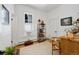 Functional bedroom featuring hardwood floors, vintage furniture, and a cozy atmosphere at 69 W Cedar Ave, Denver, CO 80223