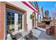 Charming porch features brick accents, a cozy atmosphere, and outdoor decor at 69 W Cedar Ave, Denver, CO 80223