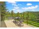 Scenic deck with seating and views, perfect for outdoor entertaining and enjoying the natural surroundings at 2398 Bitterroot Ln, Golden, CO 80401