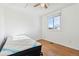 Bedroom with wood flooring, ceiling fan and window at 8478 Prairie Clover Way, Parker, CO 80134