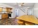 Kitchen with wood cabinets and tile flooring at 8478 Prairie Clover Way, Parker, CO 80134