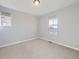 Cozy bedroom with two large windows and neutral carpeting for comfort at 2256 S Isabell Ct, Lakewood, CO 80228