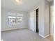 Comfortable bedroom with a closet and two bright windows with neighborhood views at 2256 S Isabell Ct, Lakewood, CO 80228