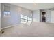 Bright bedroom features neutral carpeting, recessed lighting, and sun-filled windows at 2256 S Isabell Ct, Lakewood, CO 80228