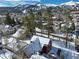 Scenic mountain views highlight the town's cozy homes, snow-capped mountains, and vibrant streets at 102 S High St, Breckenridge, CO 80424