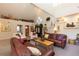 Open living room with vaulted ceilings, comfortable seating, and unique decorative elements at 102 S High St, Breckenridge, CO 80424